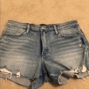 Distressed light jean shorts